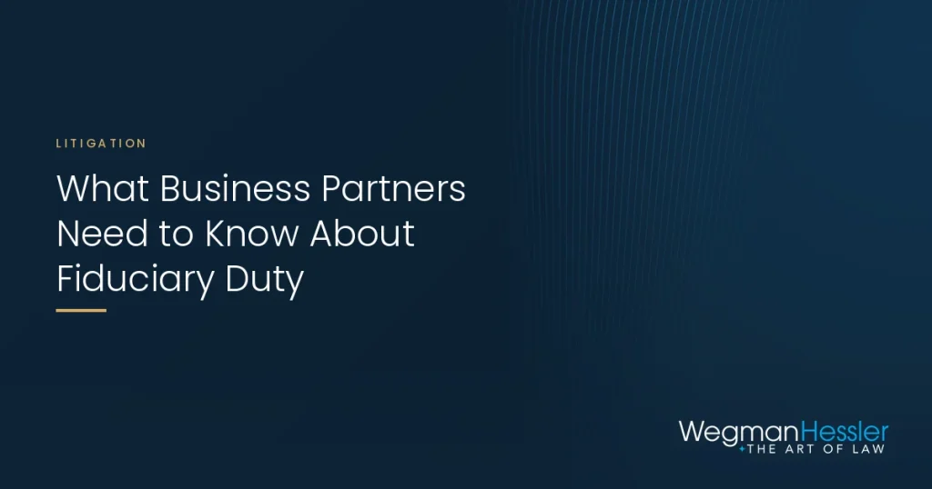 Navy Wegman Hessler graphic with blue line art for a business partnership attorney on fiduciary duty